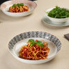 Add some style to your dining table with our modern Mali Decal pasta bowl set. It features an eye-catching geometric pattern, it is perfect for everyday dining and special occasions. Made from porcelain, it includes four place settings and is microwave and dishwasher safe for added convenience. Matching 12-piece matching dinner set is also available